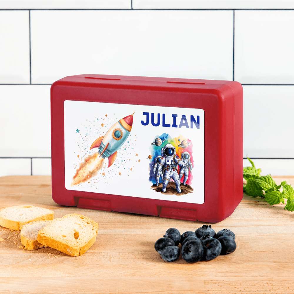 happy-prints.eu - Personalisierte Brotdose / Aufbewahrungsbox mit Astronauten Motiv mit Rakete und Name - Text und Motiv ist easy änderbar