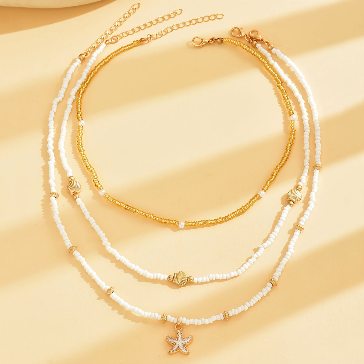 3-teiliges Damen-Halsketten-Set mit Perlen, Muscheln & Seestern in Weiß und Gold – sommerlicher Maritimer Stil für viele schöne Anlässe