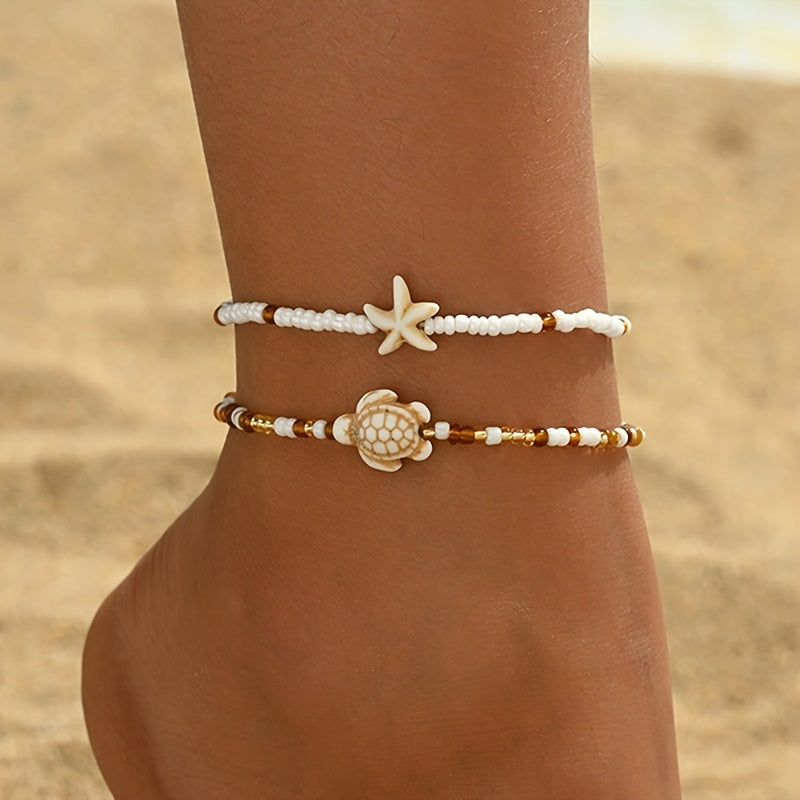 2er-Set bezaubernde maritime Damen Fußkettchen in Weiß und Beige mit Perlen, Seestern und Schildkröte