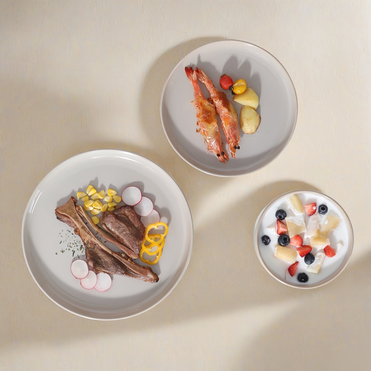 12-teiliges Steingutgeschirr-Set „Glanz & Genuss“ – Klassisches Service mit Teller, Dessertteller & Müslischalen für 4 Personen, Glatte Oberfläche & Stapelbar