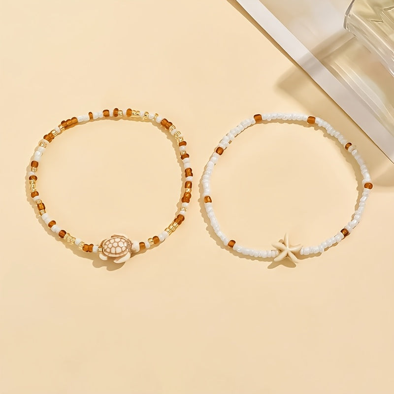 2er-Set bezaubernde maritime Damen Fußkettchen in Weiß und Beige mit Perlen, Seestern und Schildkröte